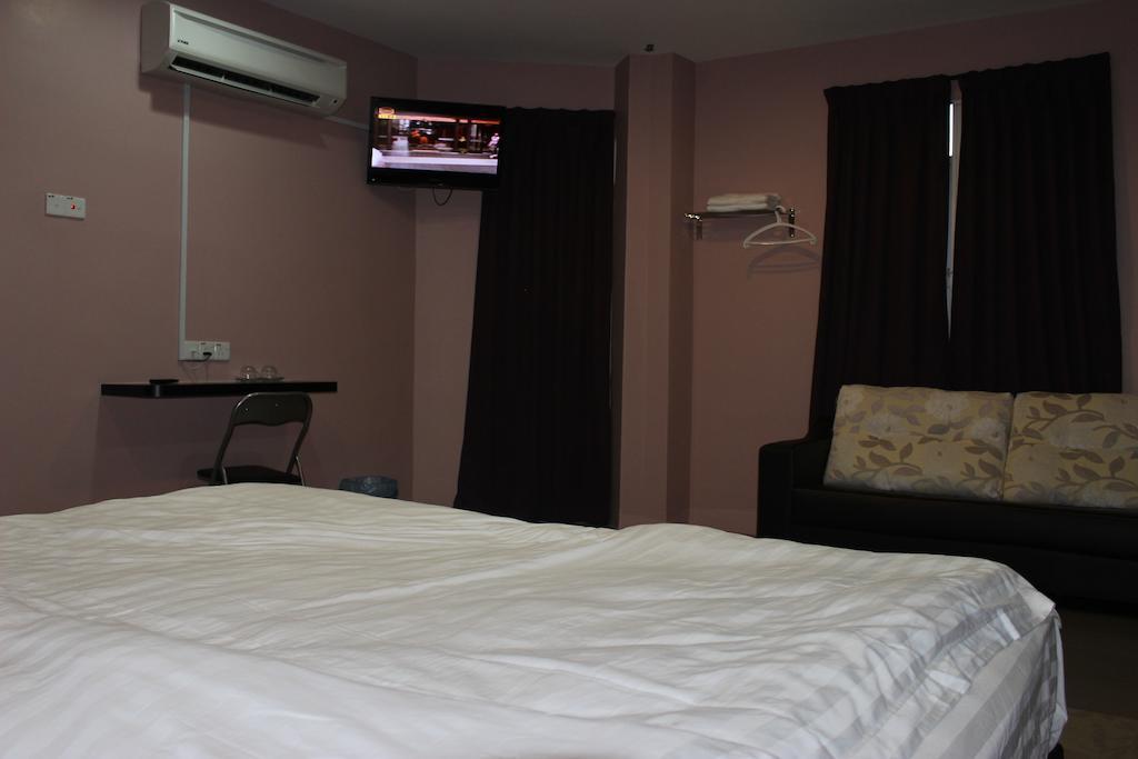 Inn Hotel Teluk Intan Szoba fotó